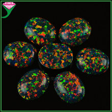 澳宝界面黑欧泊 OP32黑色火澳宝合成宝石 火彩椭圆形平底戒面裸石