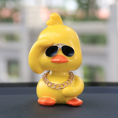 Internet Celebrity TikTok Yellow Duck Car Interior Decoration Ornaments Car Cute Car Shaking Head Doll Car Creativity (Car ornaments) - 120g-social-duck-right-hand-waving-with-gold-glasses-gold-chain