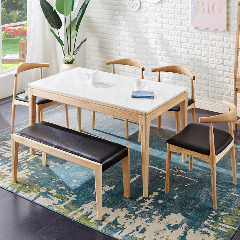 Mesa de comedor de madera maciza nórdica y combinación de sillas simple moderno pequeño apartamento mesa de comedor de mármol una Mesa seis sillas suministro directo de fábrica