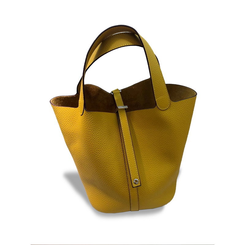 El nuevo bolso de cesta de verduras de marea de cuero togo de piel de vaca de capa superior 2025, bolso de cubo con cerradura de mano, bolso de cuero para mujer