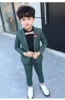 Green jacket, trousers lapel pin