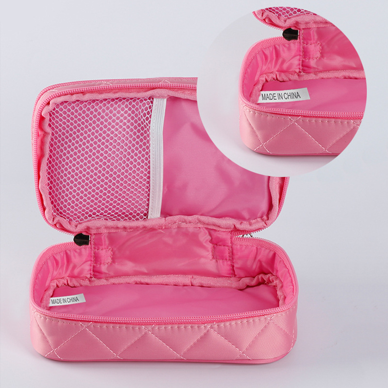 Impermeable bolsa de cosméticos de doble capa creativa geométrica rombo bolsa de lavado nueva bolsa de almacenamiento de nylon caja de cosméticos portátil al por mayor