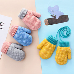 Autumn and winter toddler fingerless knitted kids' gloves wholesale, cute half-finger style with fleece lining, offering warmth and cold protection—designed for little ones to wear around the neck.