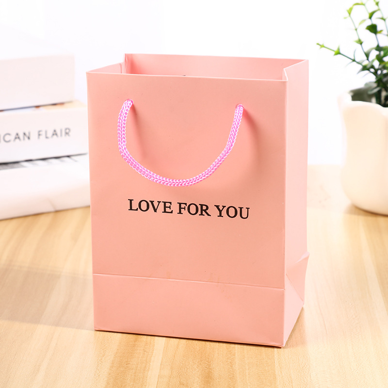 Bolso de joyería bolsa de embalaje bolsa de papel bolsa de regalo se puede imprimir logotipo en stock al por mayor diseño libre