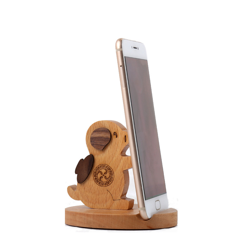 Soporte de madera para teléfonos móviles creativos Pony Teléfonos móviles Toma Monedas de haya Perezoso Teléfonos móviles Logos grabados