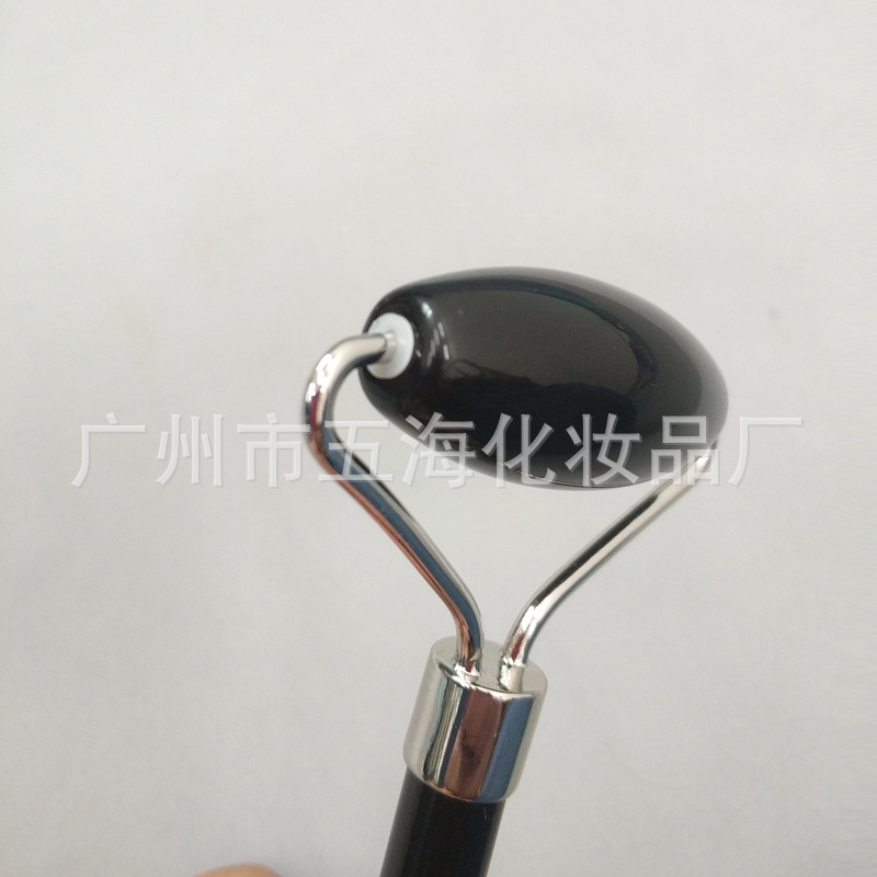 Venta directa de fábrica polvo de cristal en forma de corazón raspado Xiuyu Jade rodillo masajeador facial masaje de belleza en stock al por mayor