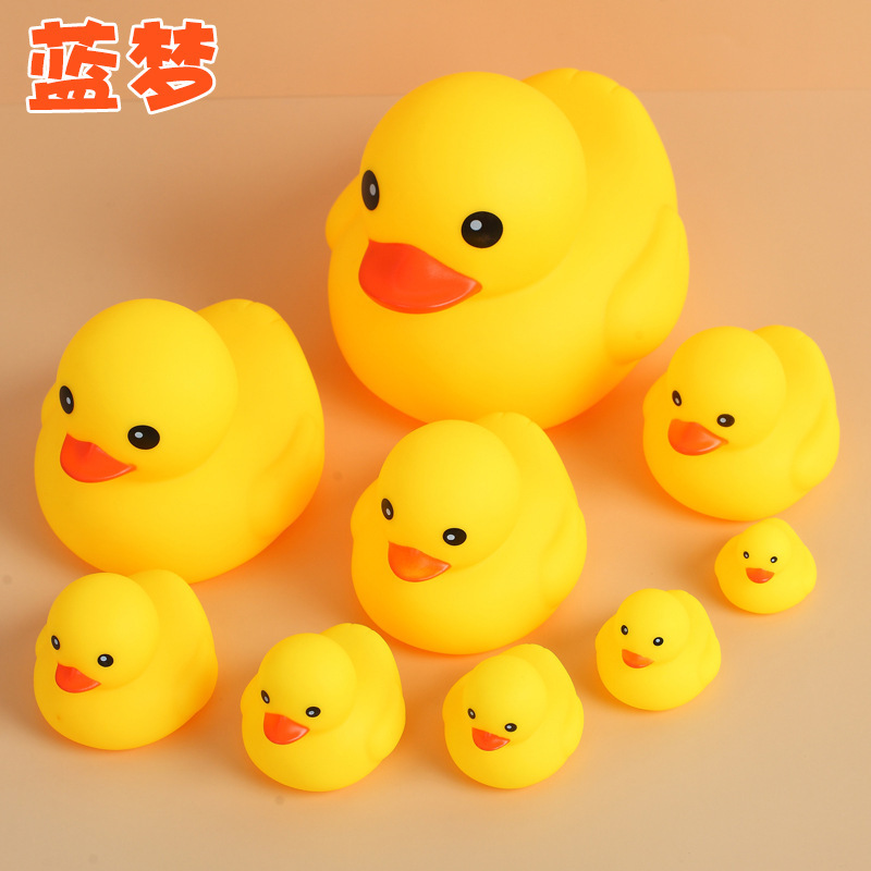 Wholesale baby bath toys vinyl duckling milk tea small gifts pinch call bathroom water playing duckling