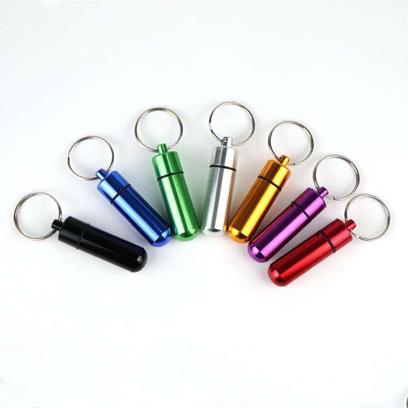 Aleación de aluminio impermeable al aire libre sellado botella colgante píldora de primeros auxilios llavero adaptador de teléfono móvil almacenamiento almacén impermeable
