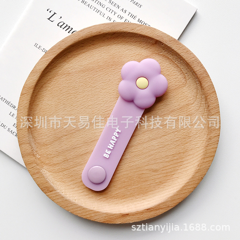 Japonés y coreano creativo Snap auricular cable organizador cable de datos fijo Winder lindo dibujos animados silicona Winder