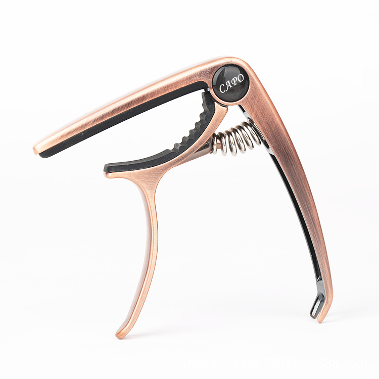 Guitarra Capo aleación de zinc Capo guitarra folk de doble propósito de afinación guitarra eléctrica fábrica al por mayor accesorios para instrumentos musicales
