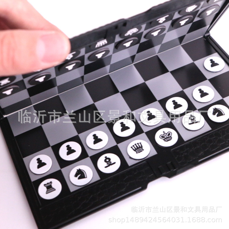 Magnetic handheld folding chess