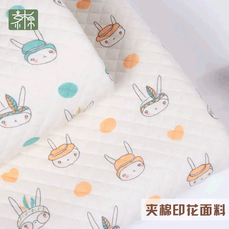 40s精梳棉卡通印花夹棉布针织空气层面料秋冬婴儿服装布料夹层