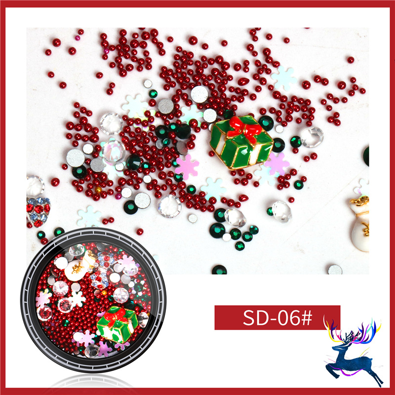 Joyería de uñas especial de Navidad Santa Claus copo de nieve regalo aleación remache Perla taladro de uñas mezclado