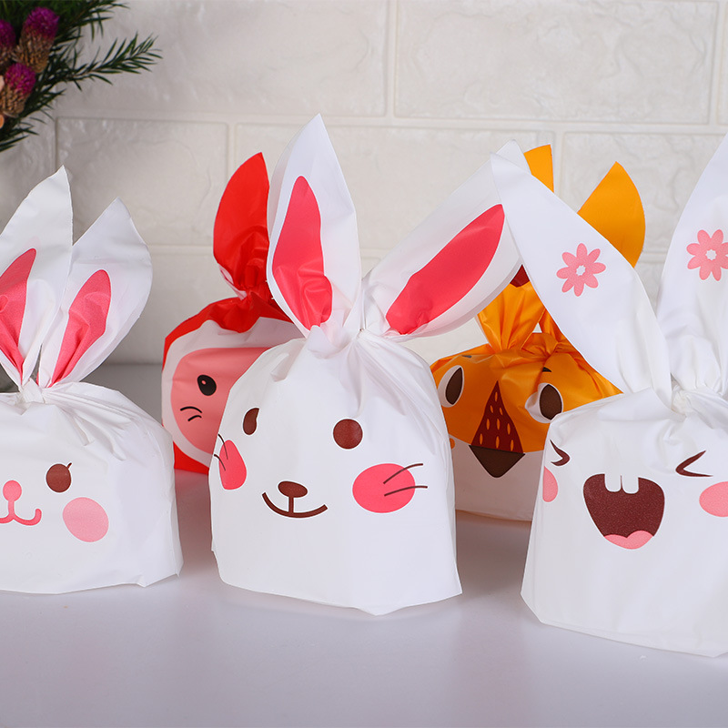 Una variedad de regalos de boda lindos oreja de conejo bolsa de caramelo bolsa de galletas caramelo leche azufaifo bolsa de embalaje al por mayor 50