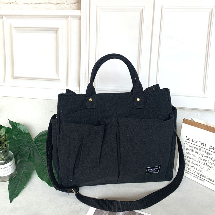 Nuevo estilo japonés bolsa de lona bolsa de mensajero de las mujeres de moda simple bolsa de tela estudiante bolso de lona casual