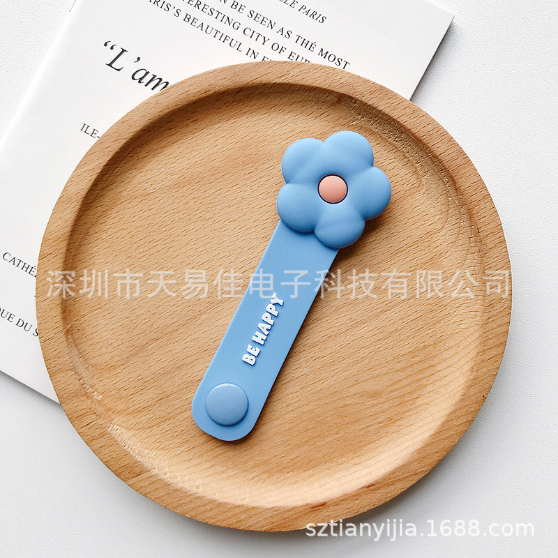 Japonés y coreano creativo Snap auricular cable organizador cable de datos fijo Winder lindo dibujos animados silicona Winder