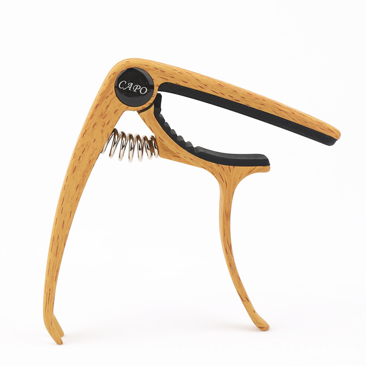 Guitarra Capo aleación de zinc Capo guitarra folk de doble propósito de afinación guitarra eléctrica fábrica al por mayor accesorios para instrumentos musicales