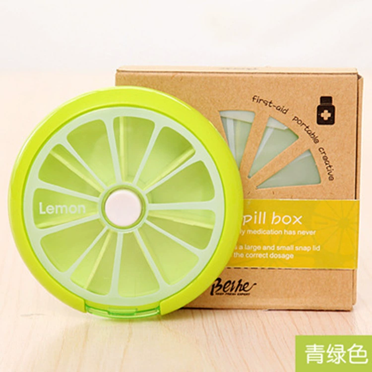 Fruit‑shaped plastic storage box, 7‑compartment portable pill organizer, 9×2.5 cm