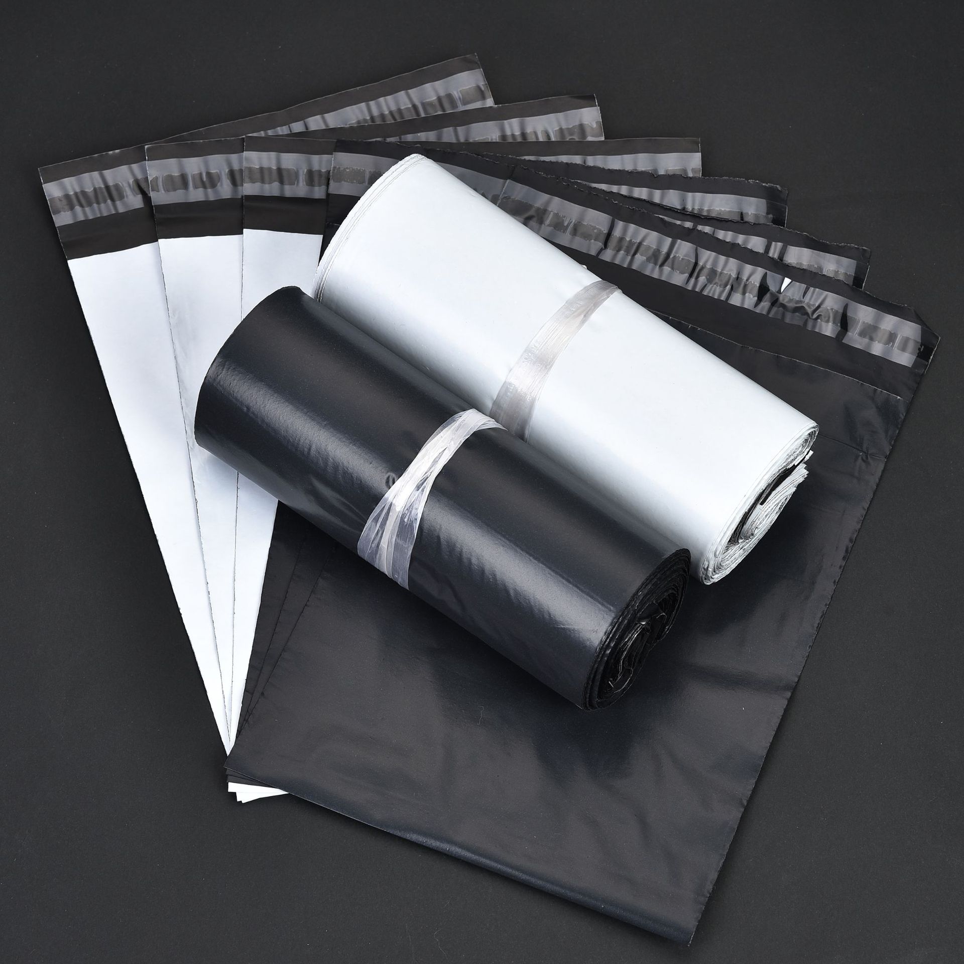 Bolsas de embalaje logístico reforzadas, bolsas de mensajería blancas, bolsas de logística para comercio electrónico de múltiples especificaciones, bolsas con adhesivo fuerte al por mayor.