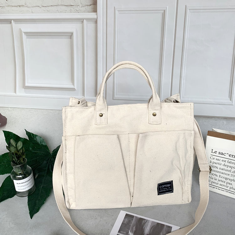 Nuevo estilo japonés bolsa de lona bolsa de mensajero de las mujeres de moda simple bolsa de tela estudiante bolso de lona casual