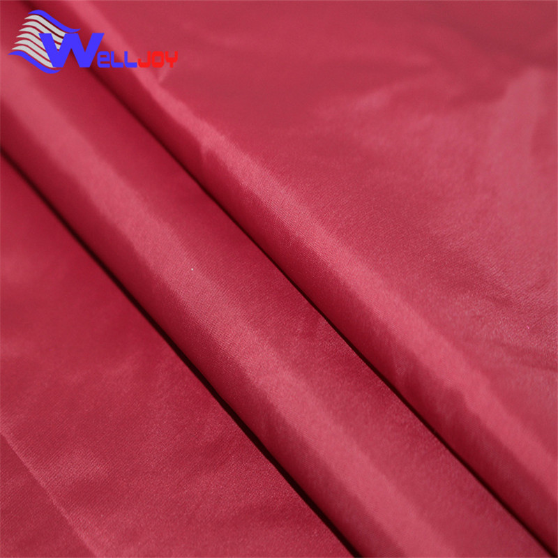 厂家供应数码印花尼丝纺涤纶面料 羽绒服哑光无胆染色防绒面料