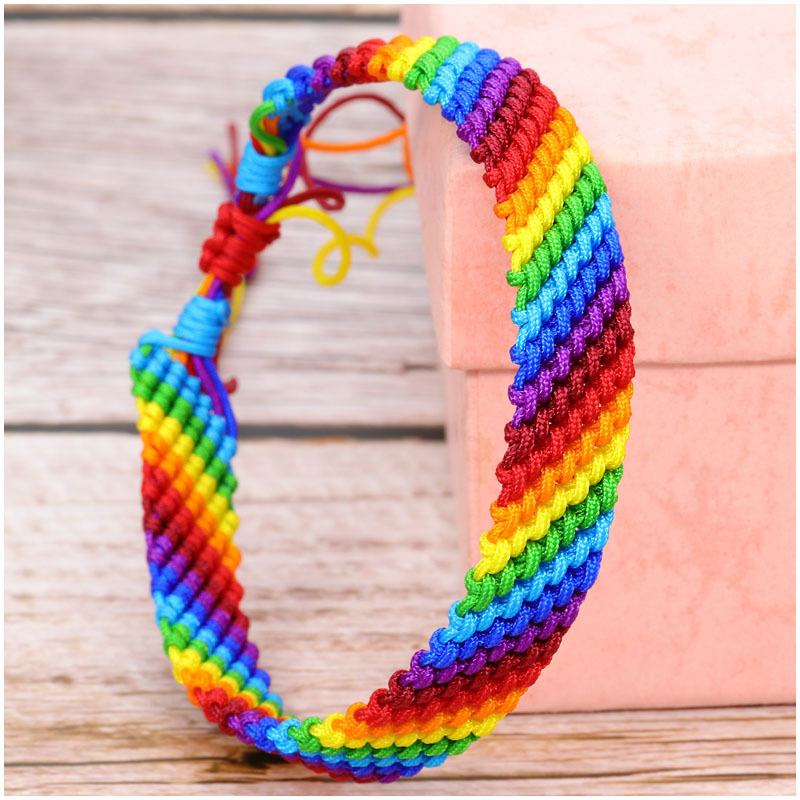 Factory wholesale European and American popular polyester thread men's and girls' colorful rope rainbow hand-woven bracelet