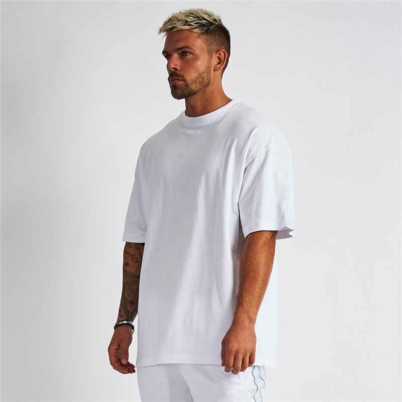 Comercio exterior más tamaño color sólido en blanco culturismo suelto fitness deportes de manga corta Camiseta hombres de moda transpirable camisa de media manga de los hombres