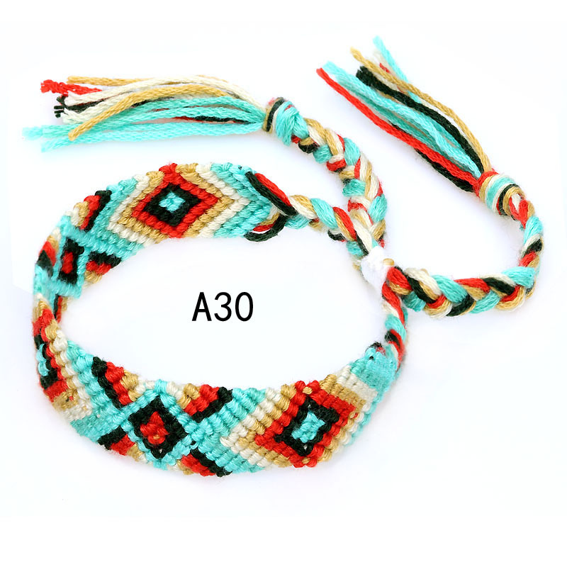 La Venta caliente europea y americana tejida pulsera Nepal estilo étnico tejido a mano Arco Iris Lucky amistad pulsera