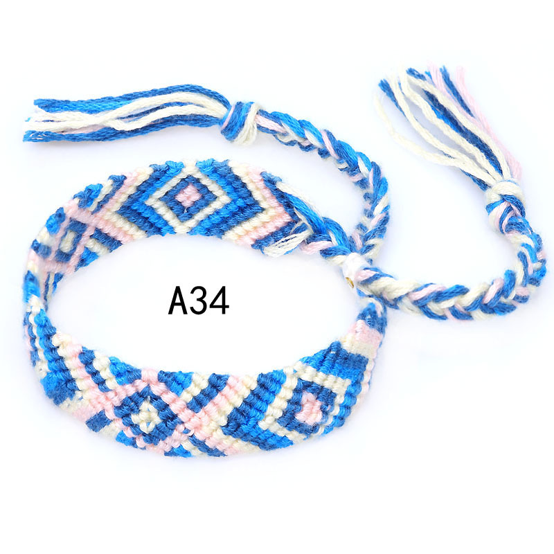 La Venta caliente europea y americana tejida pulsera Nepal estilo étnico tejido a mano Arco Iris Lucky amistad pulsera
