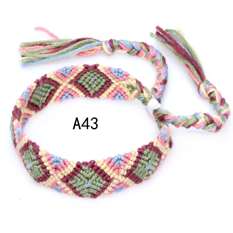 La Venta caliente europea y americana tejida pulsera Nepal estilo étnico tejido a mano Arco Iris Lucky amistad pulsera