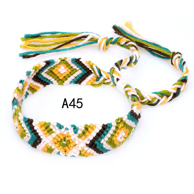 La Venta caliente europea y americana tejida pulsera Nepal estilo étnico tejido a mano Arco Iris Lucky amistad pulsera