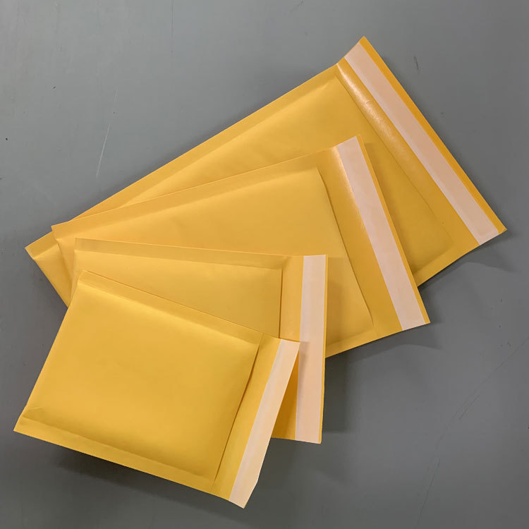 En stock amarillo Kraft bolsa de burbuja de papel bolsa de ropa burbuja engrosada expreso burbuja sobre bolsa de burbuja sobre