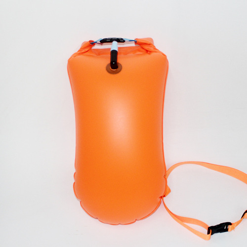 Air-inflatable swimming float with storage for manufacturer's single airbag, follow-me ball, waterproof drifting swimming bag