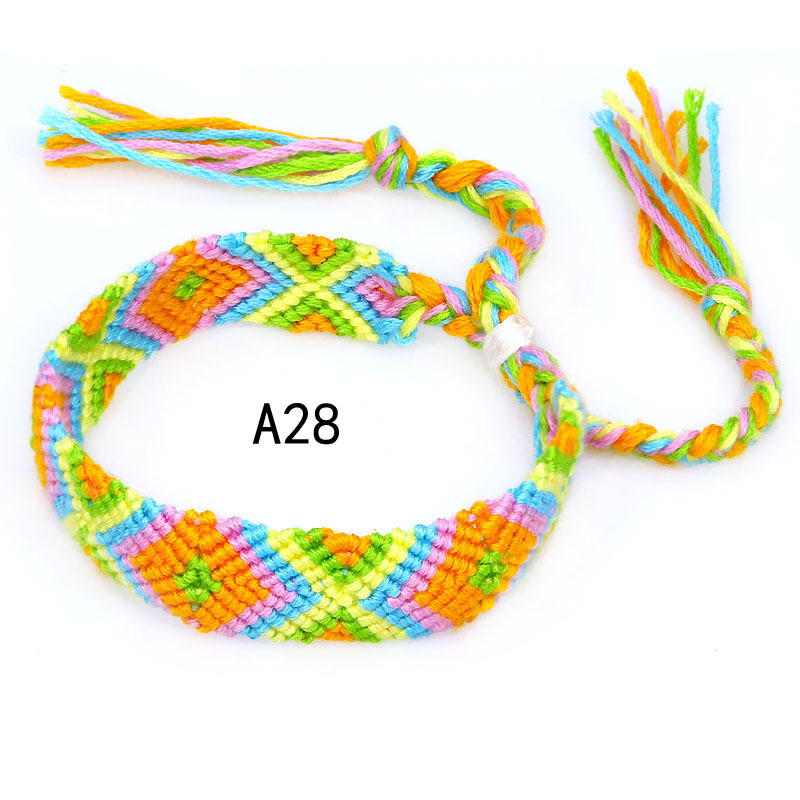 La Venta caliente europea y americana tejida pulsera Nepal estilo étnico tejido a mano Arco Iris Lucky amistad pulsera