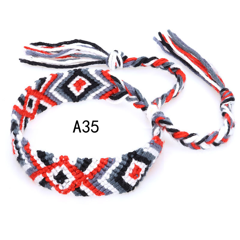 La Venta caliente europea y americana tejida pulsera Nepal estilo étnico tejido a mano Arco Iris Lucky amistad pulsera