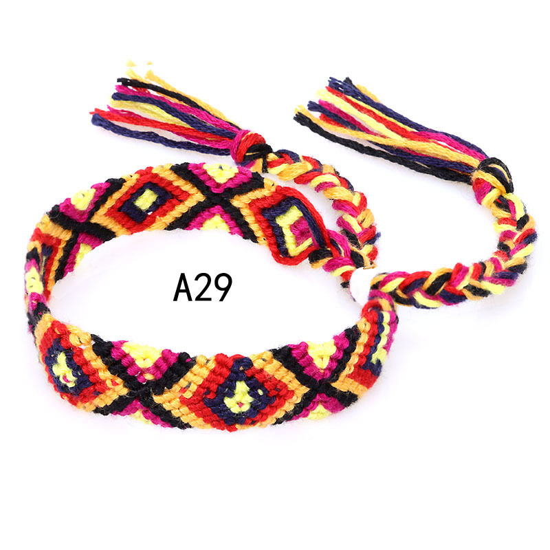 La Venta caliente europea y americana tejida pulsera Nepal estilo étnico tejido a mano Arco Iris Lucky amistad pulsera
