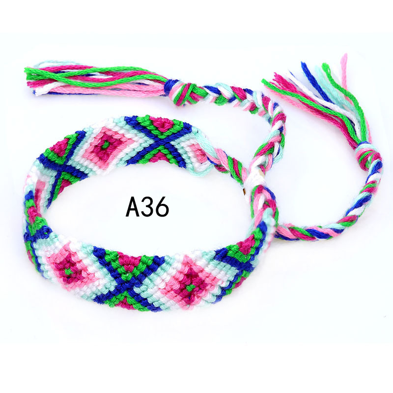 La Venta caliente europea y americana tejida pulsera Nepal estilo étnico tejido a mano Arco Iris Lucky amistad pulsera
