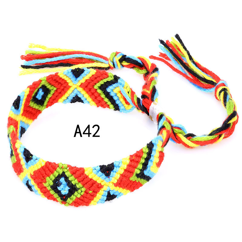 La Venta caliente europea y americana tejida pulsera Nepal estilo étnico tejido a mano Arco Iris Lucky amistad pulsera