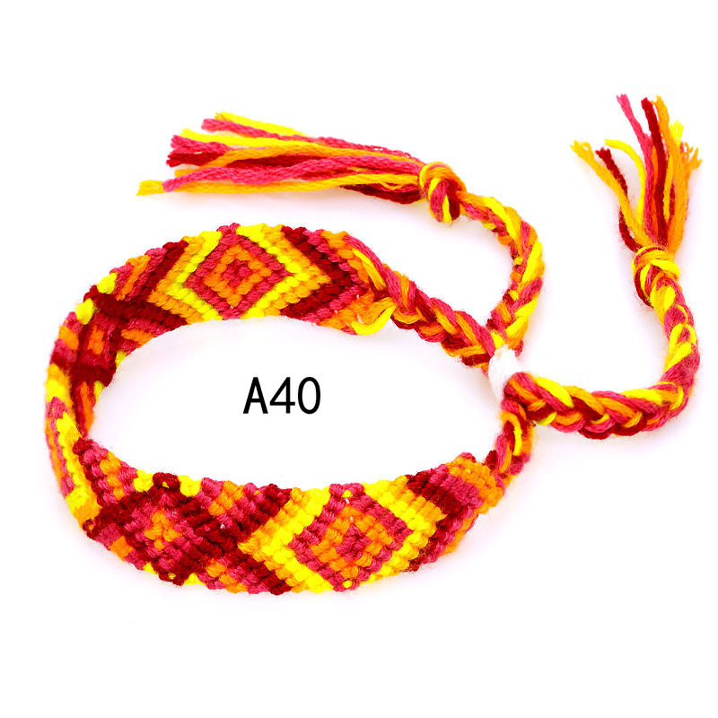 La Venta caliente europea y americana tejida pulsera Nepal estilo étnico tejido a mano Arco Iris Lucky amistad pulsera