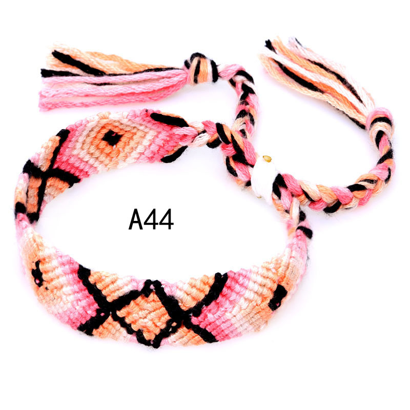 La Venta caliente europea y americana tejida pulsera Nepal estilo étnico tejido a mano Arco Iris Lucky amistad pulsera