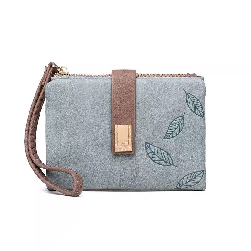 Cartera de comercio exterior transfronterizo de Amazon AliExpress para mujer, estilo corto, monedero retro europeo y americano con cremallera mate para mujer.