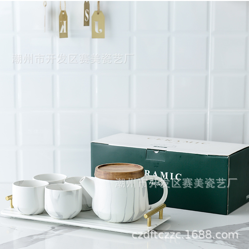 Directo de fábrica creativa flor juego de té simple regalo del hogar con la bandeja juego de té una olla cuatro tazas de cerámica juego de té caja de regalo