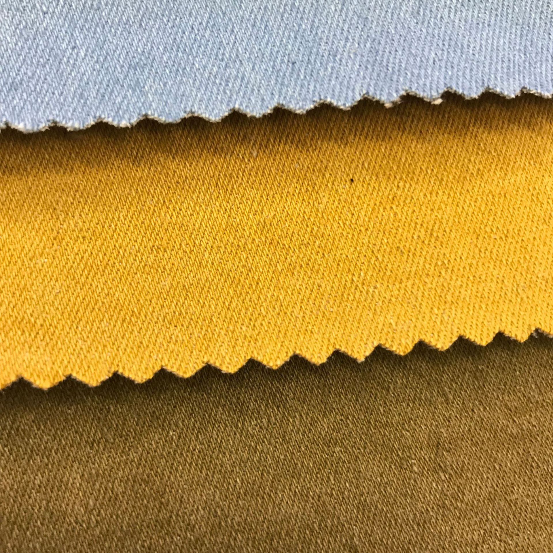 Tela de mezclilla de moda tela de mezclilla teñida de hilo tejido de mezclilla de sarga elástica de algodón TR explosión de ventas directas de fábrica