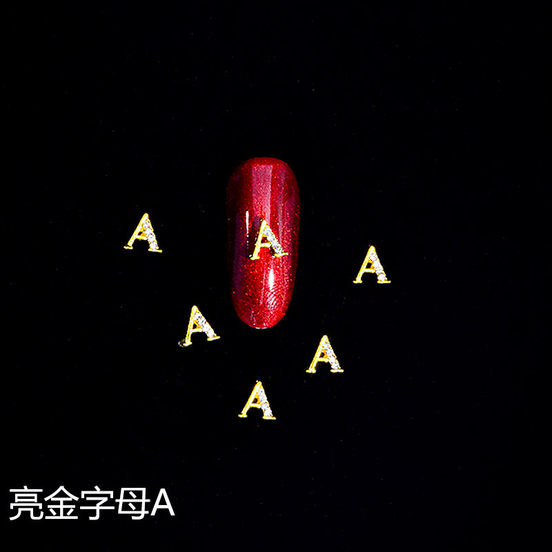 Nuevo LZ manicura 26 letras aleación joyería estilo japonés manicura online celebridad estilo brillante oro letras joyería clavo Taladro