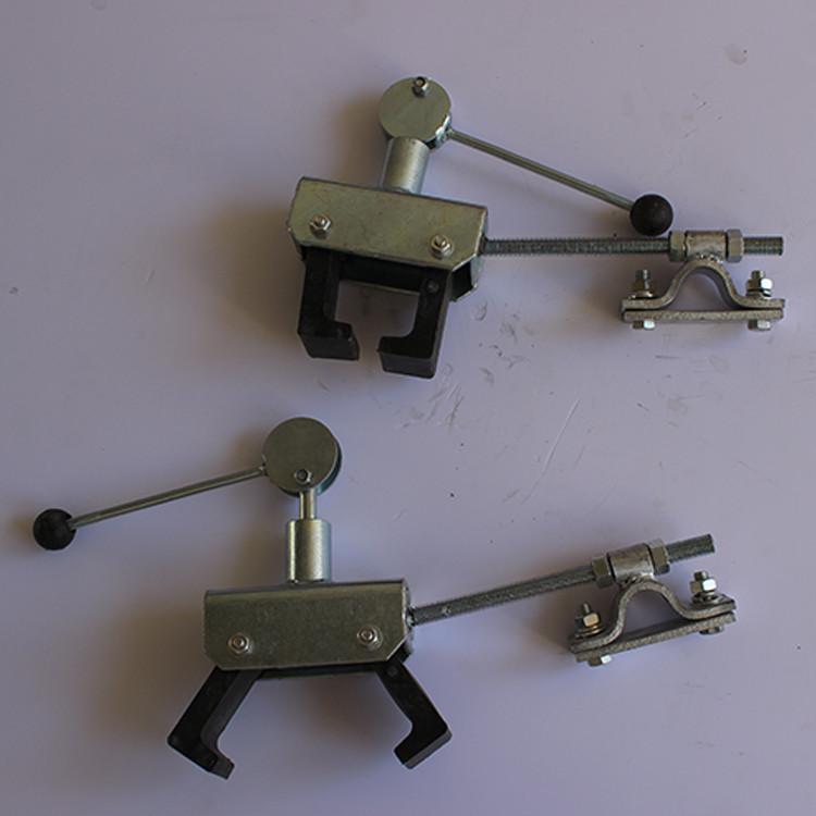 防倾斜侧翻制动抓轨机 业兴牌梯车抓轨器 防倾器山东供应