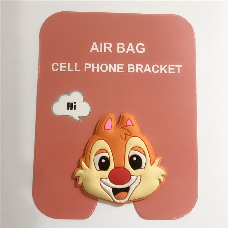 En stock al por mayor TikTok Cartoon creativo soporte de teléfono móvil puede soportar airbag soporte de teléfono móvil soporte de escritorio