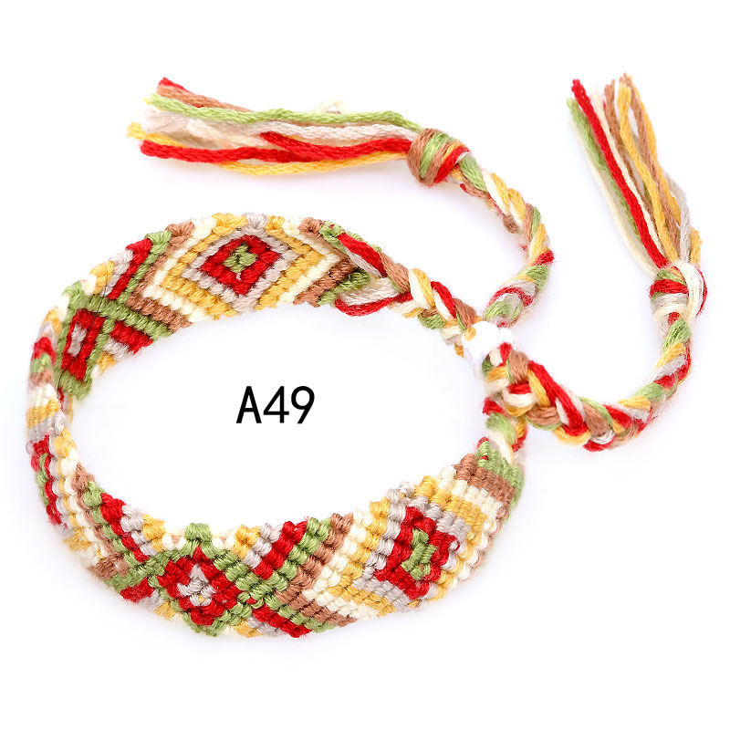 La Venta caliente europea y americana tejida pulsera Nepal estilo étnico tejido a mano Arco Iris Lucky amistad pulsera