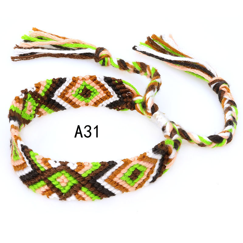 La Venta caliente europea y americana tejida pulsera Nepal estilo étnico tejido a mano Arco Iris Lucky amistad pulsera