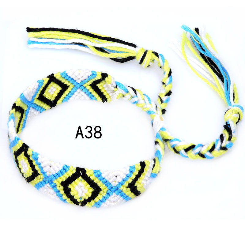 La Venta caliente europea y americana tejida pulsera Nepal estilo étnico tejido a mano Arco Iris Lucky amistad pulsera