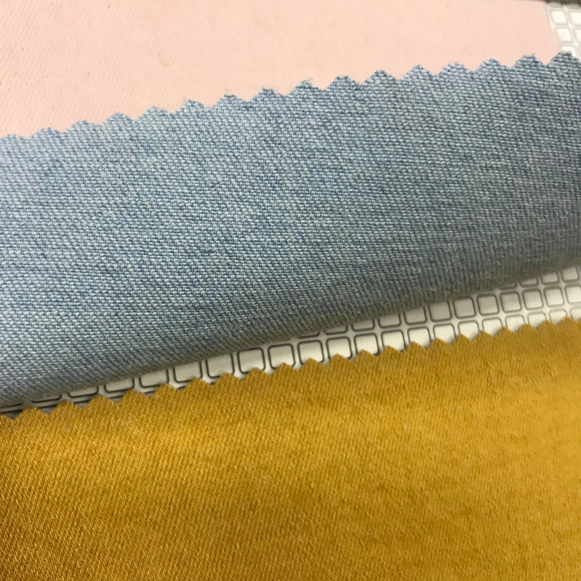 Tela de mezclilla de moda tela de mezclilla teñida de hilo tejido de mezclilla de sarga elástica de algodón TR explosión de ventas directas de fábrica